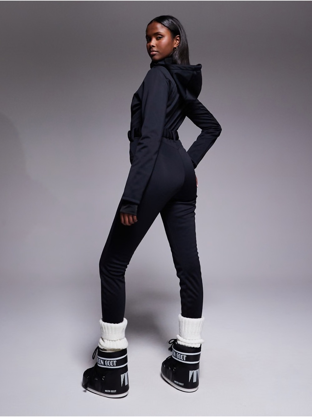 ASOS 4505 black hourglass ski suit / snowsuit with fur hood and stirrups US 10